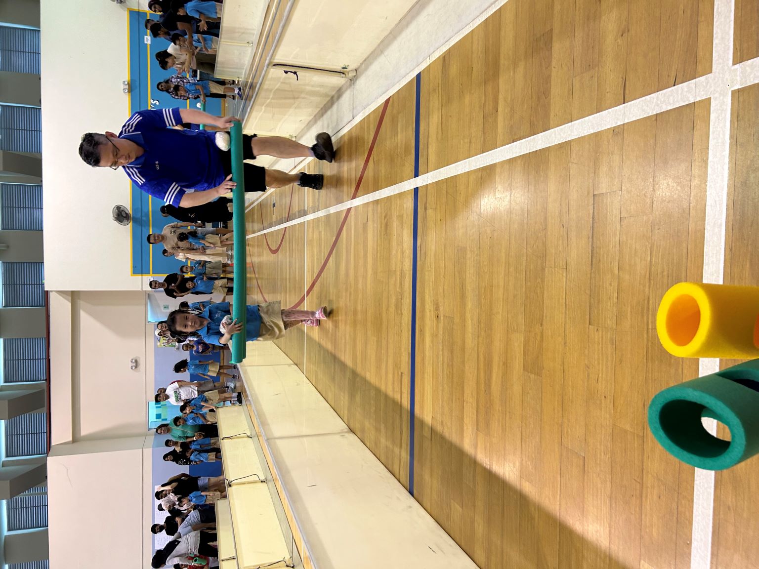 Look at this parent and child running and making sure the ball does not drop.